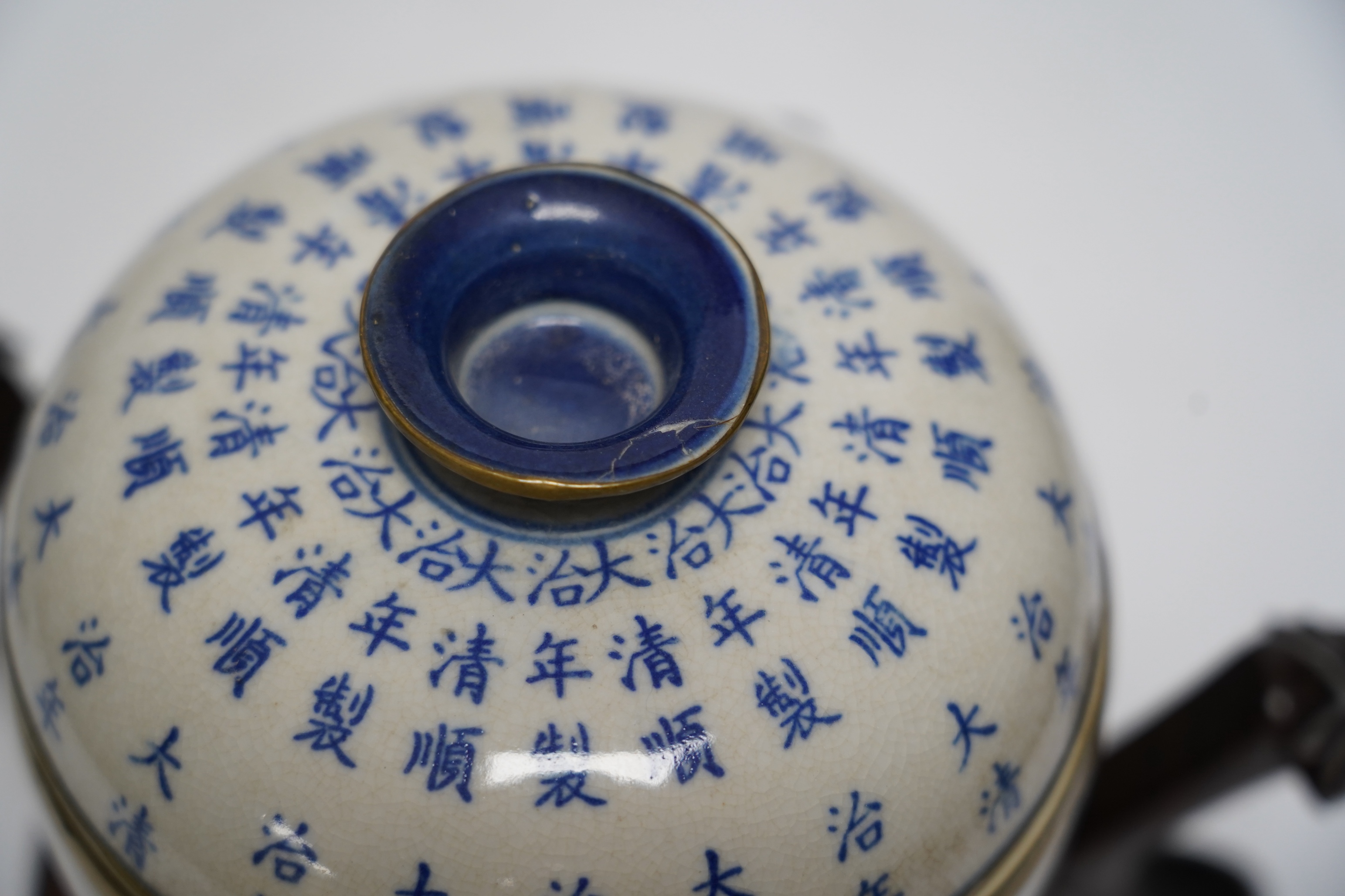 Oriental items to include a cylindrical blue and white vase with associated hardwood stand, a Japanese watercolour painting on silk together with a Japanese bamboo page turner